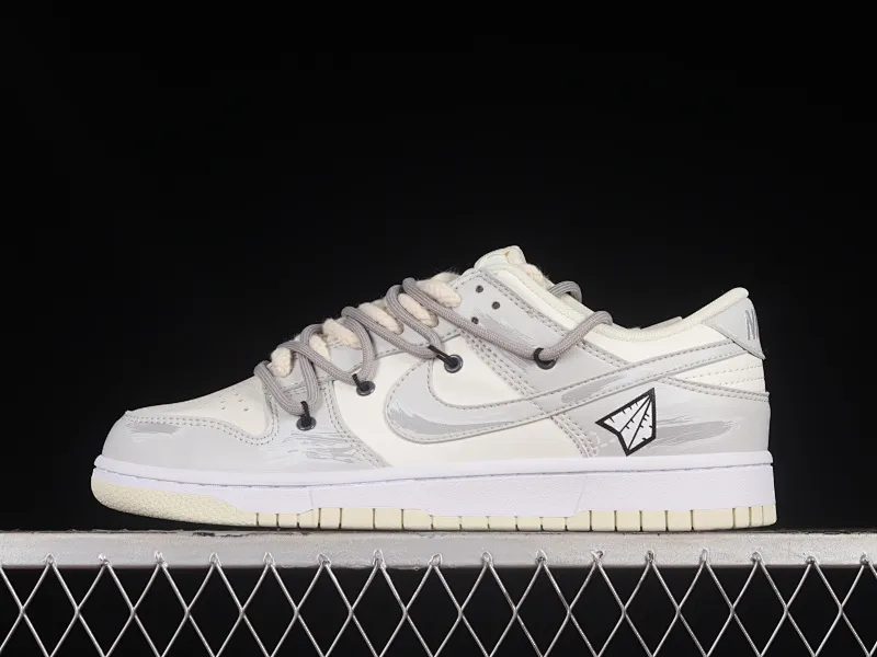 All Categories Nk SB Dunk Series Nk SB Dunk Low Low-top Sneakers Nk Dunk Low Retro "Coconut Milk" Vibe Wind Distressed Paper Plane Travel Graffiti Customized Deconstructed Strap Casual Sneakers DJ6188-100